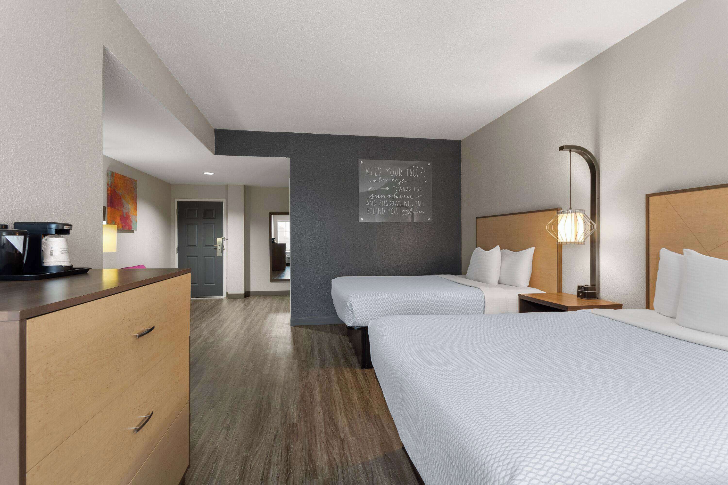 Deluxe Room, 2 Queen Beds, Non Smoking | Premium bedding, in-room safe, desk, iron/ironing board