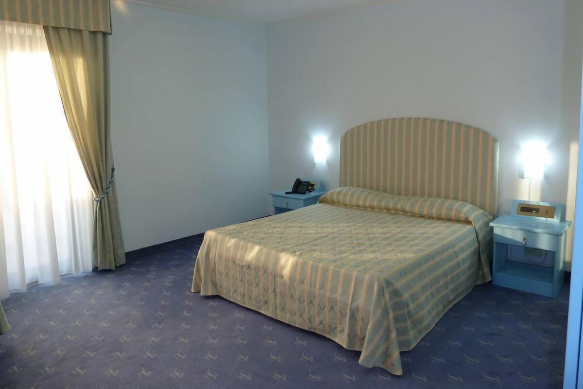 Junior Suite, 1 Double Bed | Minibar, in-room safe, desk, blackout drapes
