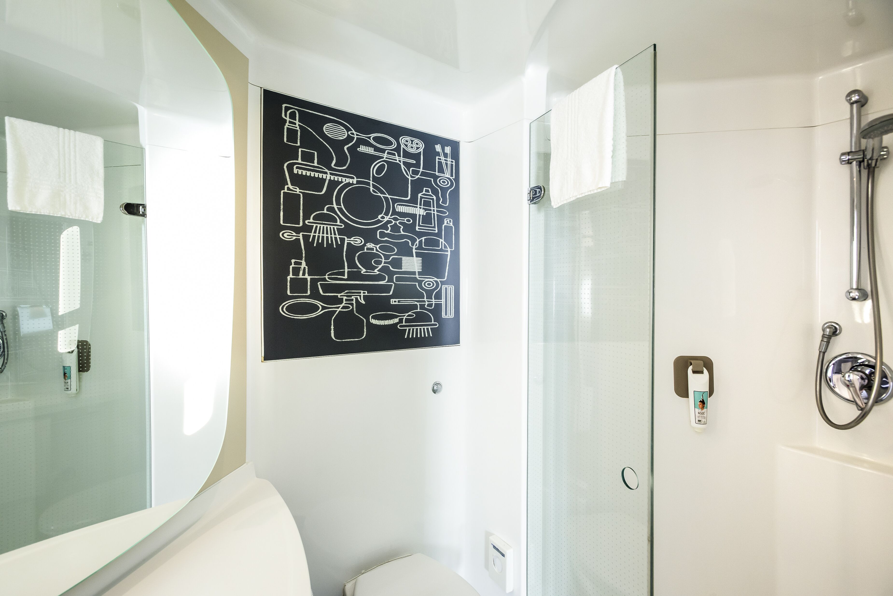 eco-friendly toiletries, hair dryer, towels