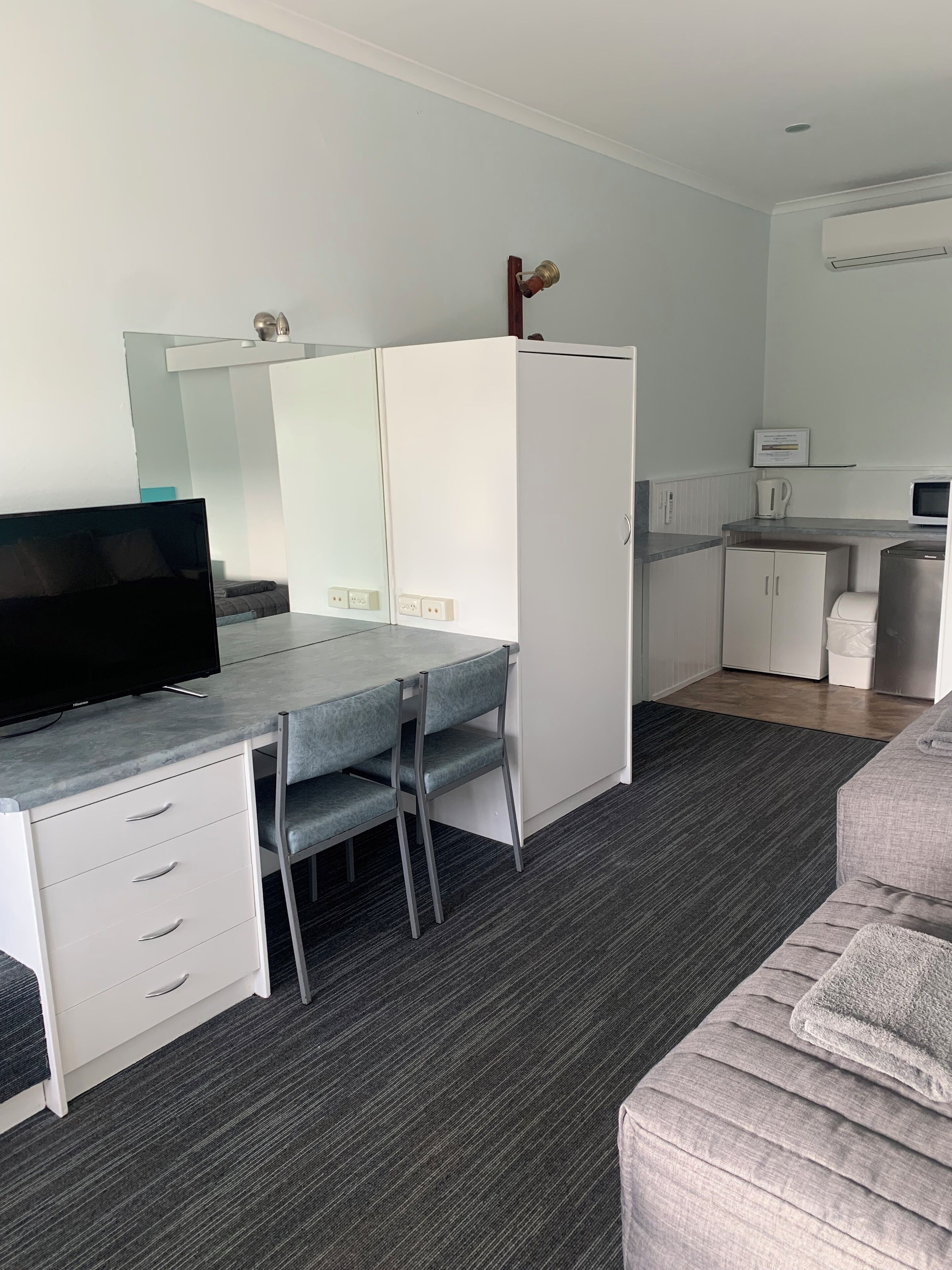 2 room family suite #07 | living area | 0-inch flat-screen tv with digital channels, tv