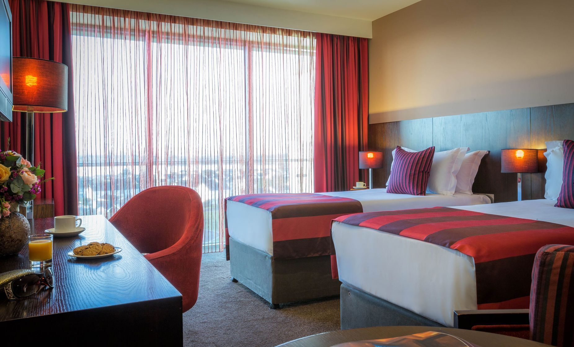 Hypo-allergenic bedding, desk, laptop workspace, blackout curtains