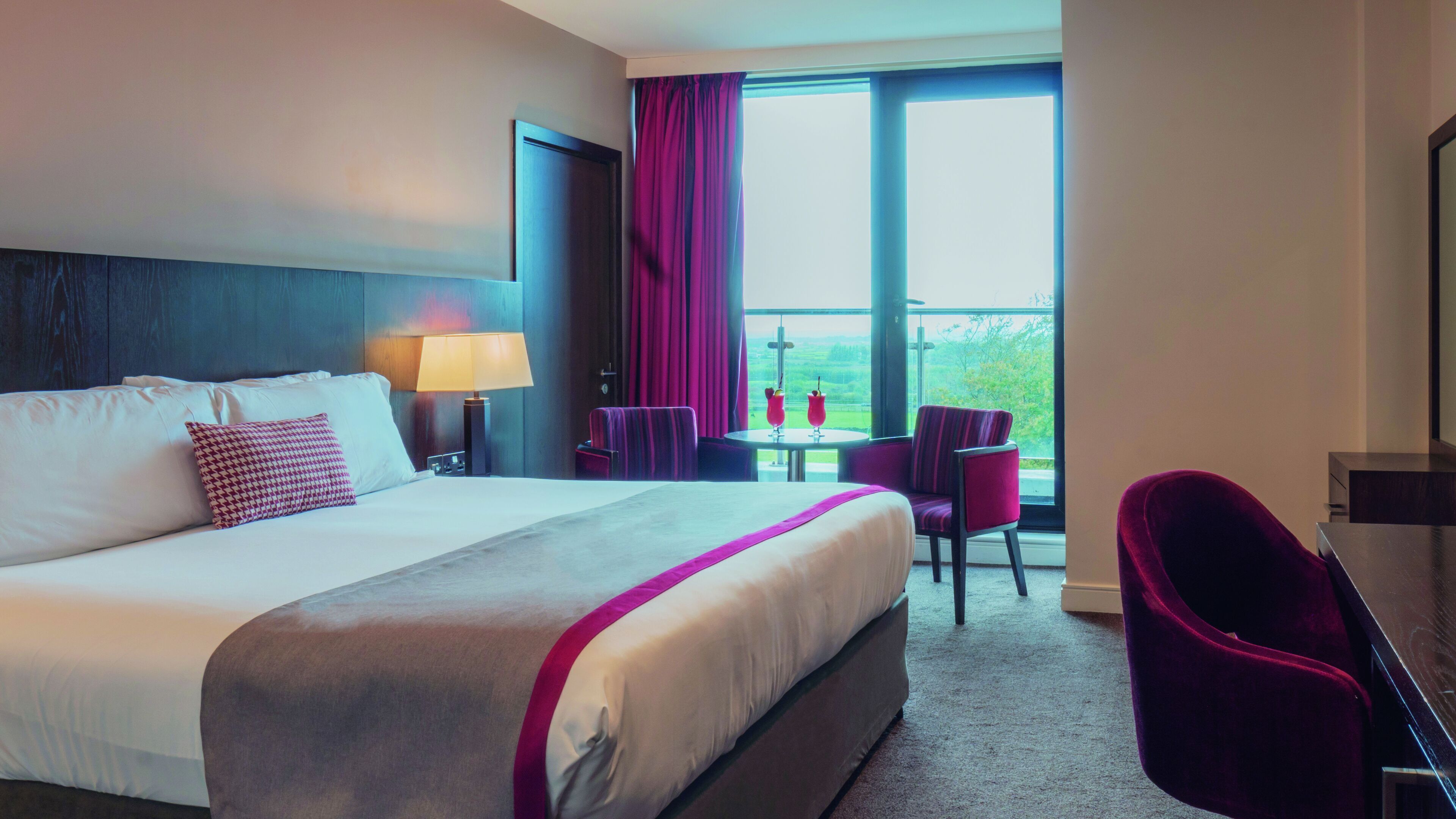 Hypo-allergenic bedding, desk, laptop workspace, blackout curtains