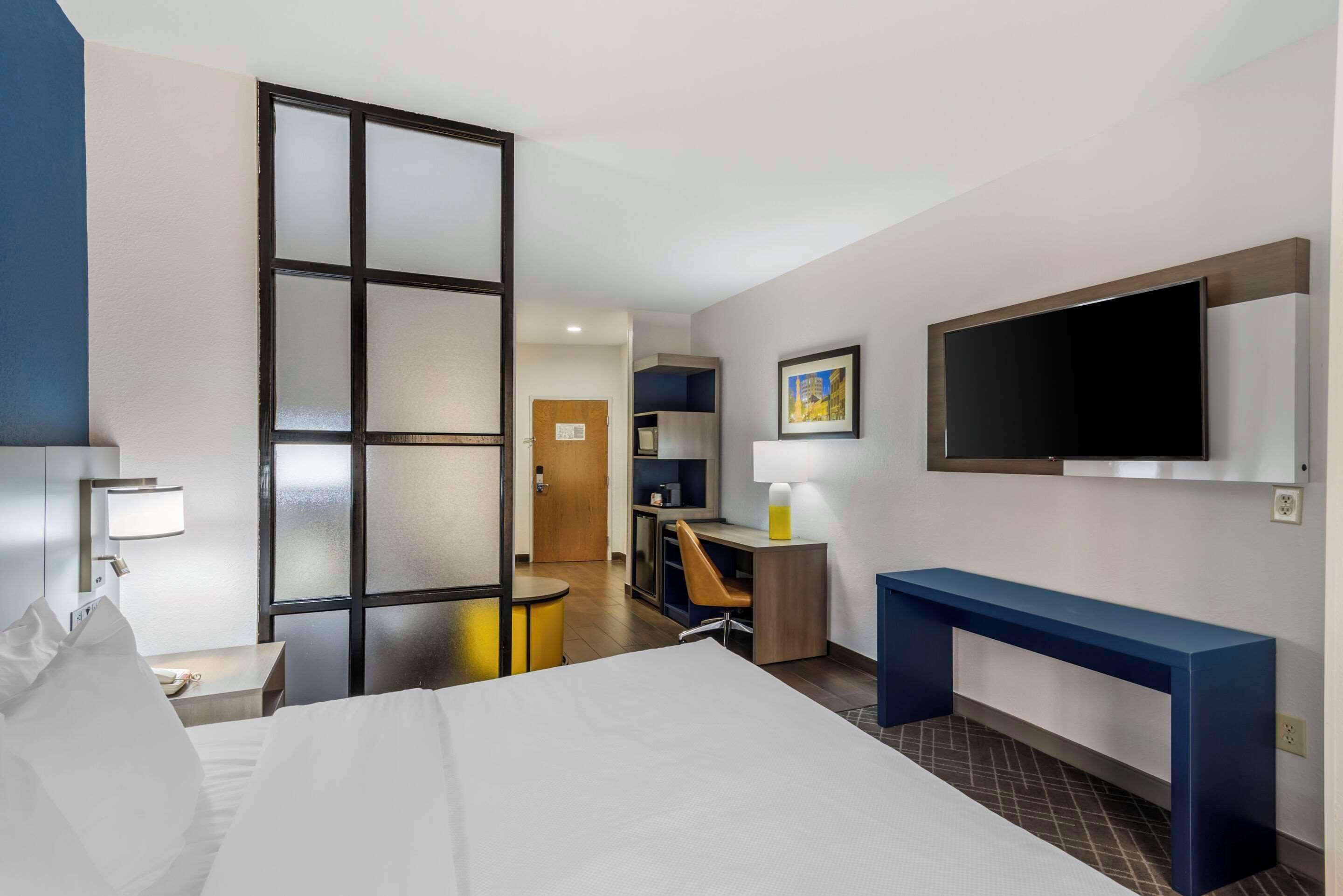 suite, 1 king bed, non smoking | individually decorated, individually furnished, desk, blackout curtains