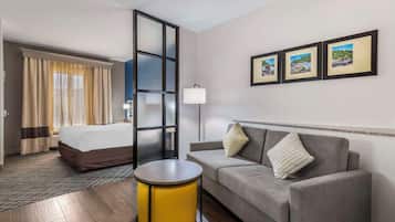 Suite, 1 King Bed, Non Smoking | Individually decorated, individually furnished, desk, blackout curtains