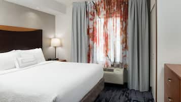 Desk, laptop workspace, blackout drapes, iron/ironing board