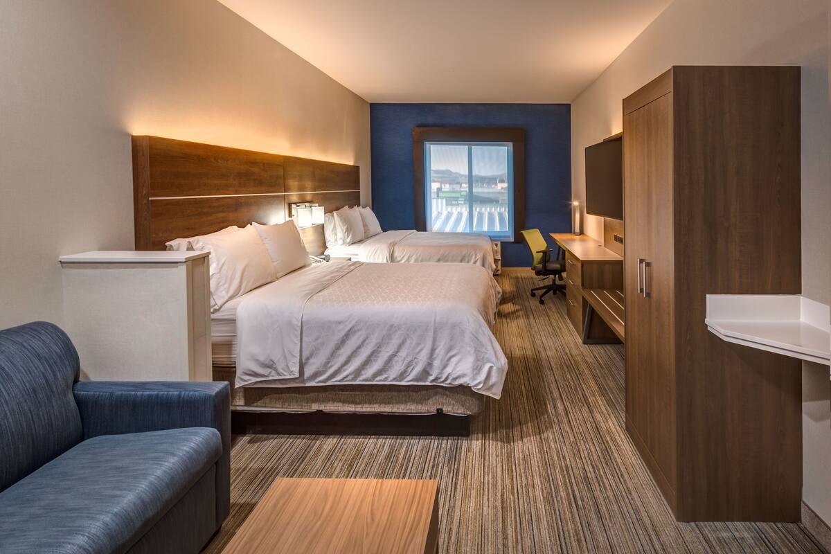 In-room safe, desk, iron/ironing board, cribs (free)