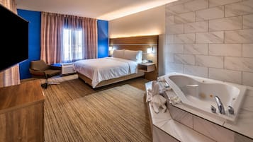 Suite, 1 Tempat Tidur King, jet tub | Brankas, meja kerja, setrika/meja setrika, dan tempat tidur bayi gratis