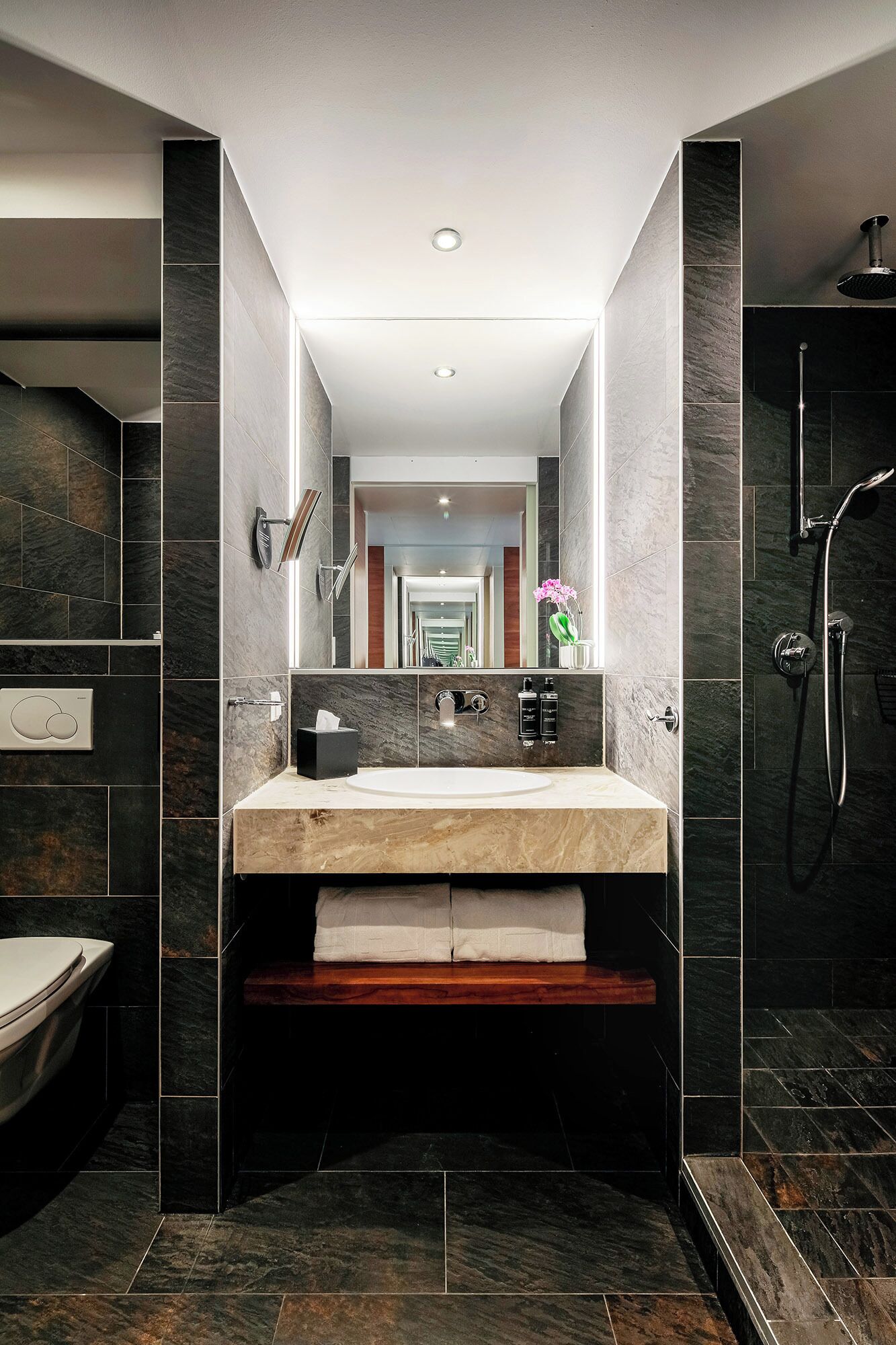 rainfall showerhead, eco-friendly toiletries, hair dryer, towels