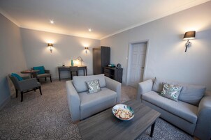 Suite | Living room | 27-inch LCD TV with satellite channels, TV