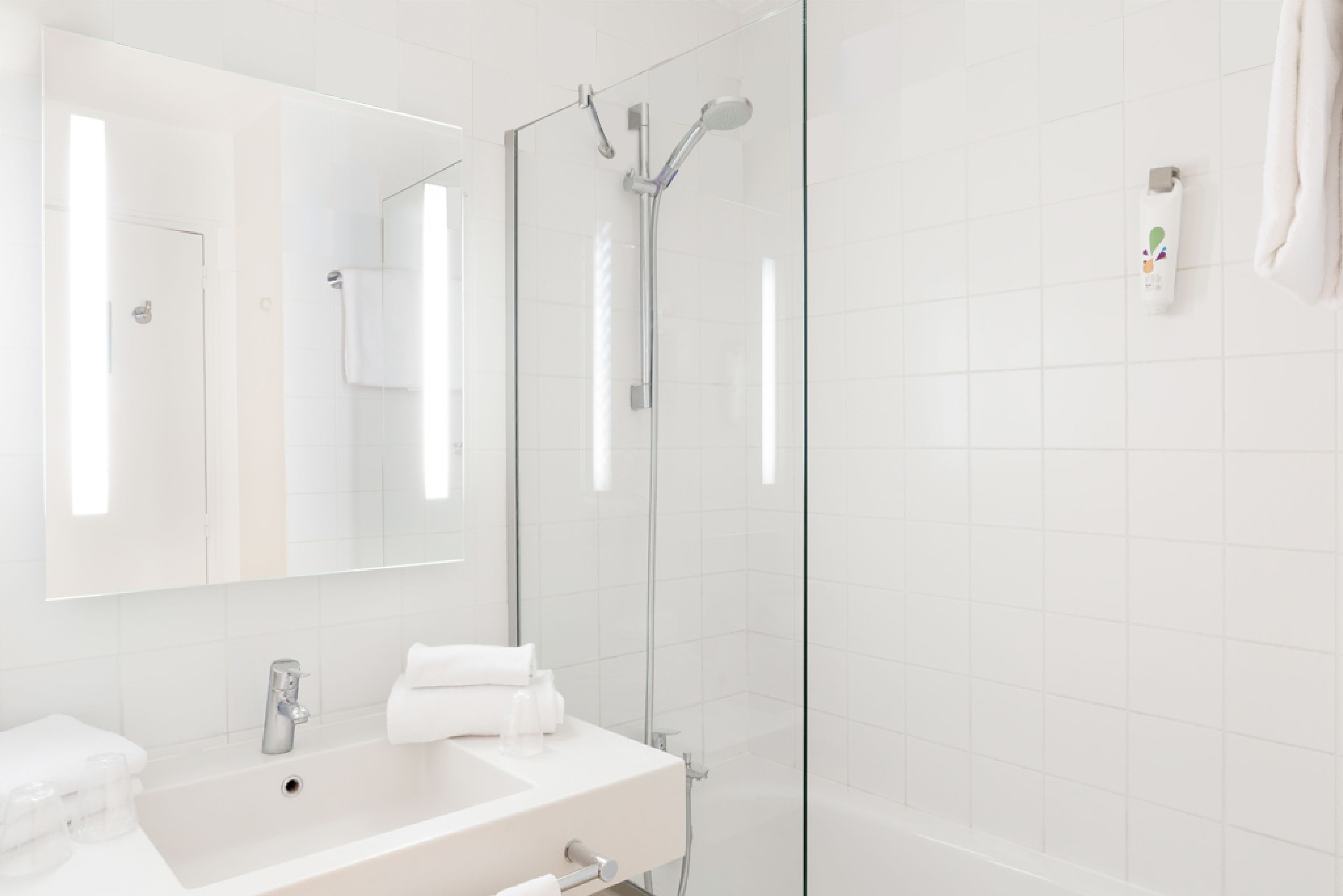 eco-friendly toiletries, hair dryer, towels