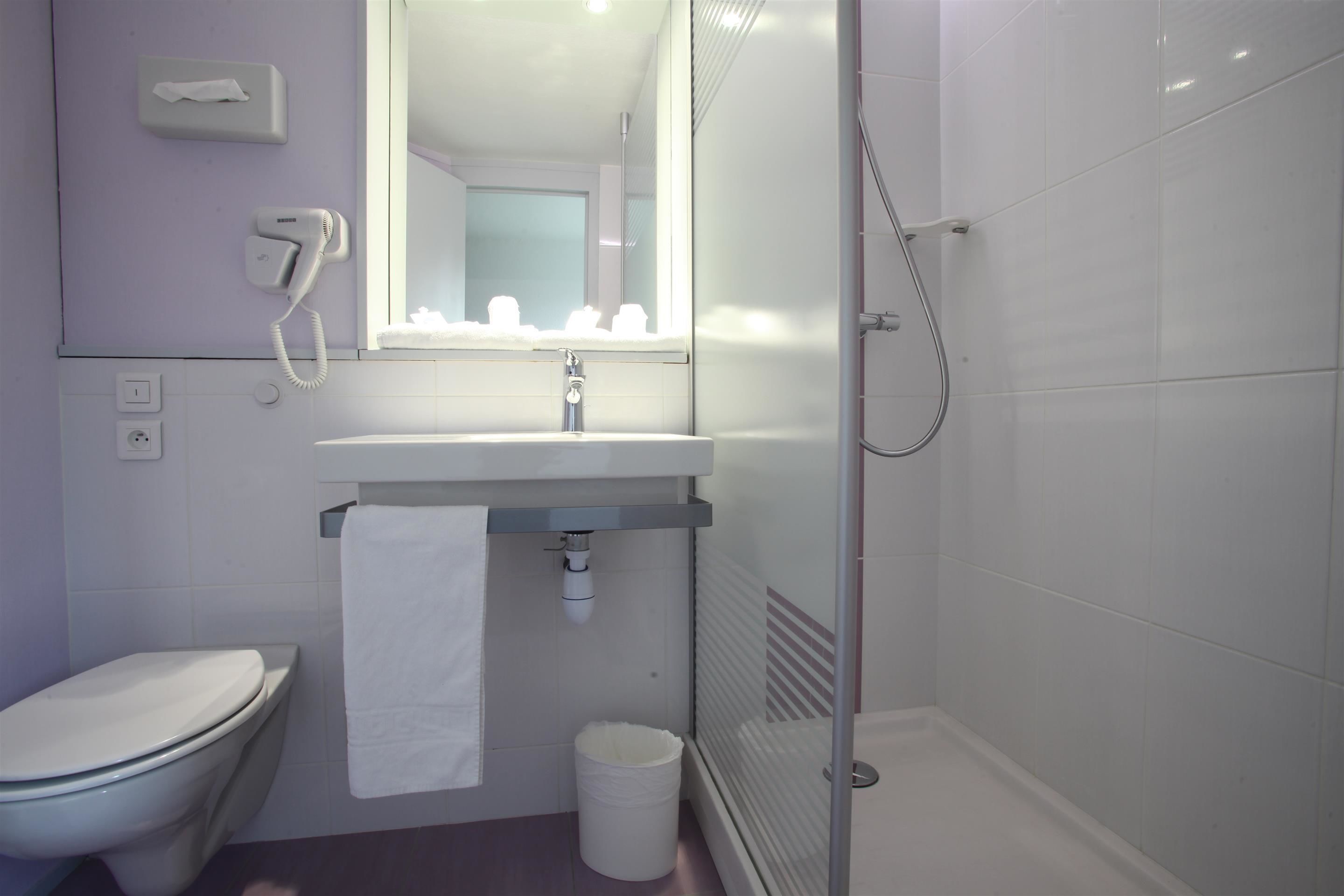 eco-friendly toiletries, hair dryer, towels