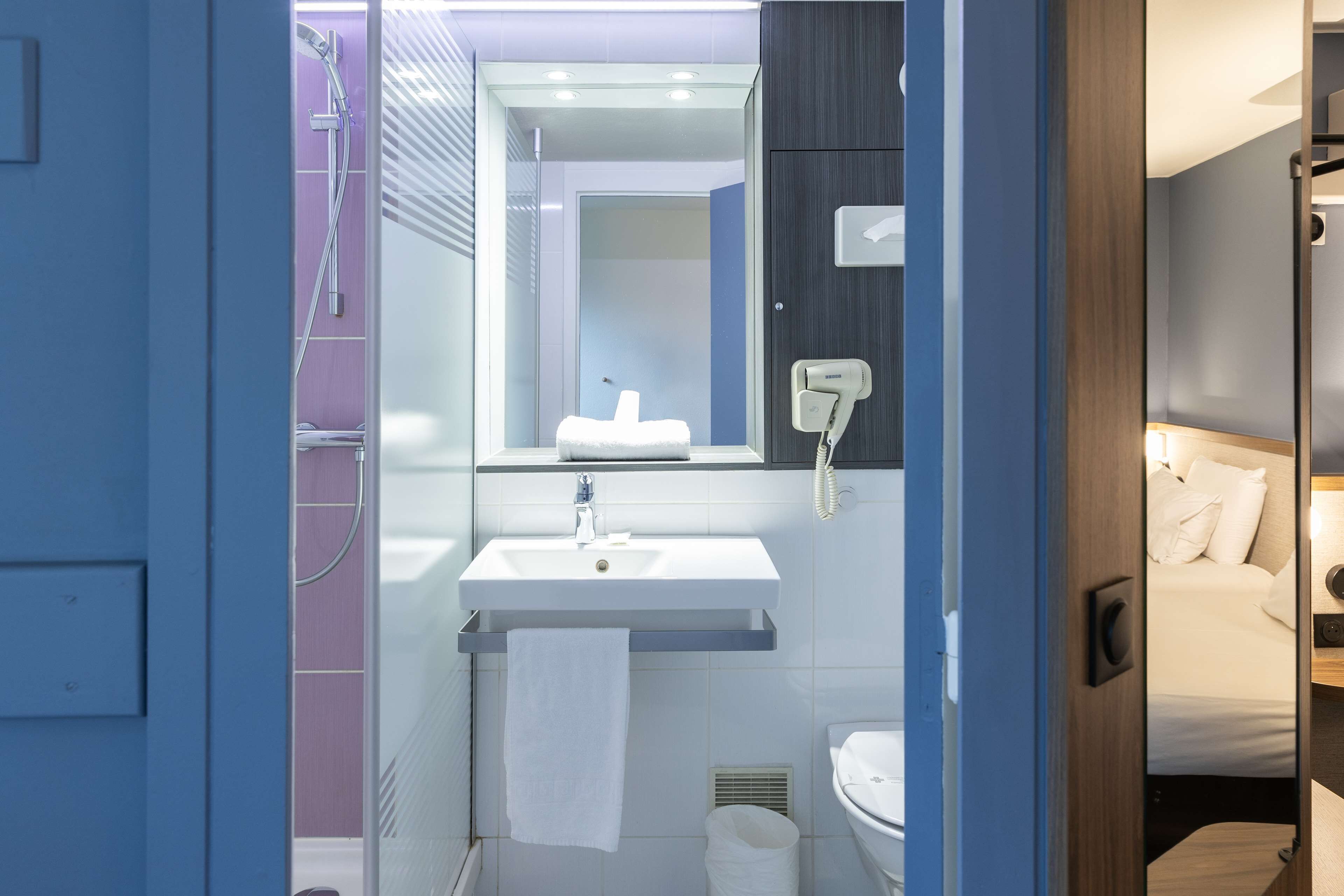 eco-friendly toiletries, hair dryer, towels