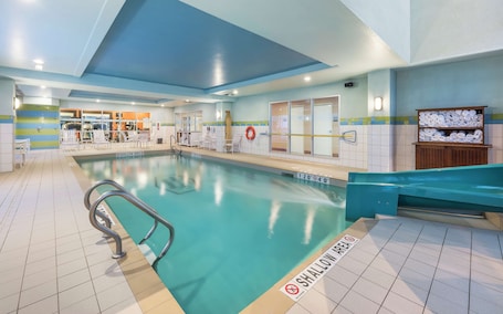 Indoor pool, open 7:00 AM to 10:00 PM, pool loungers. Hampton Inn & Suites by Hilton Moncton