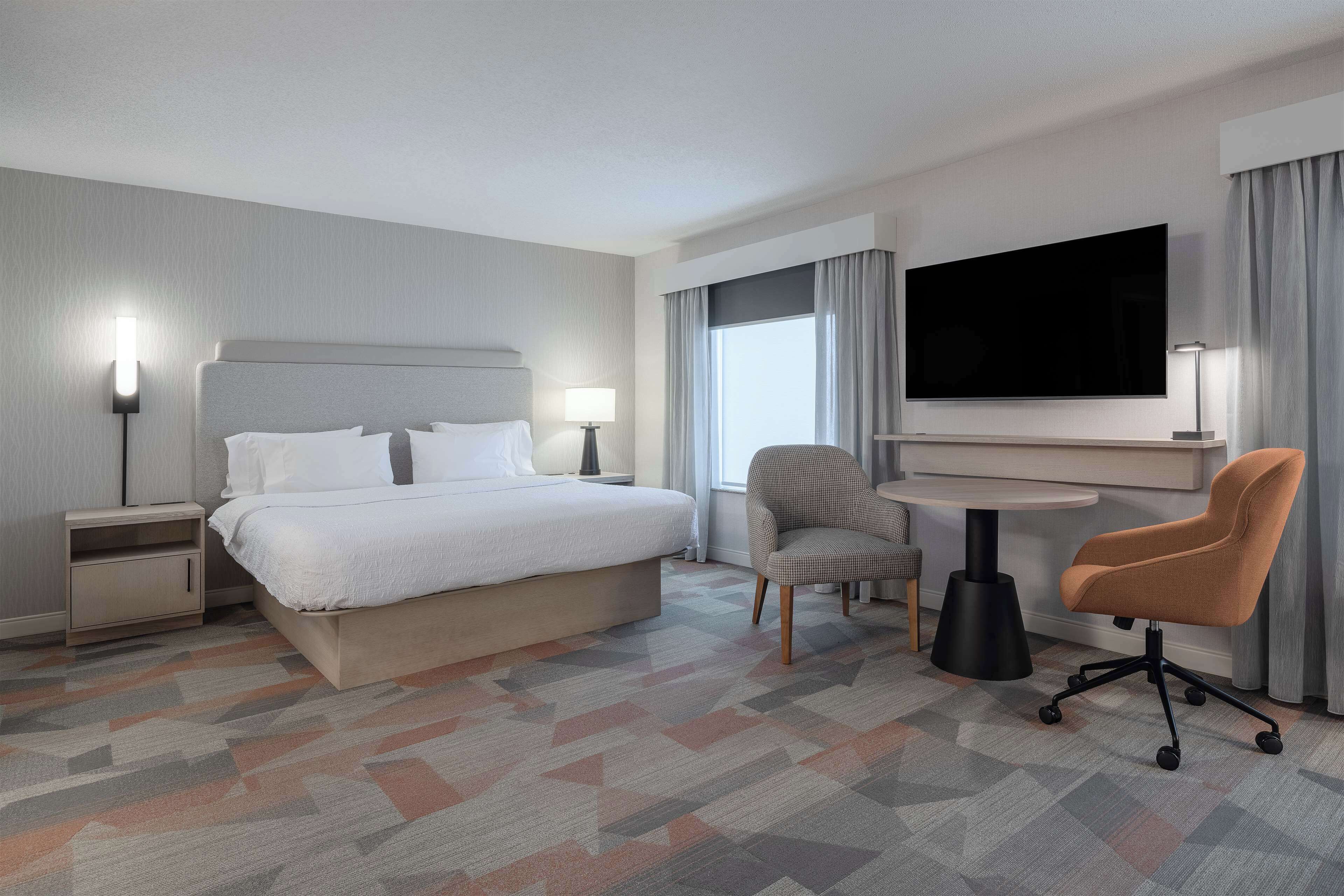 one king studio suite non smoking | living area | flat-screen tv, pay films