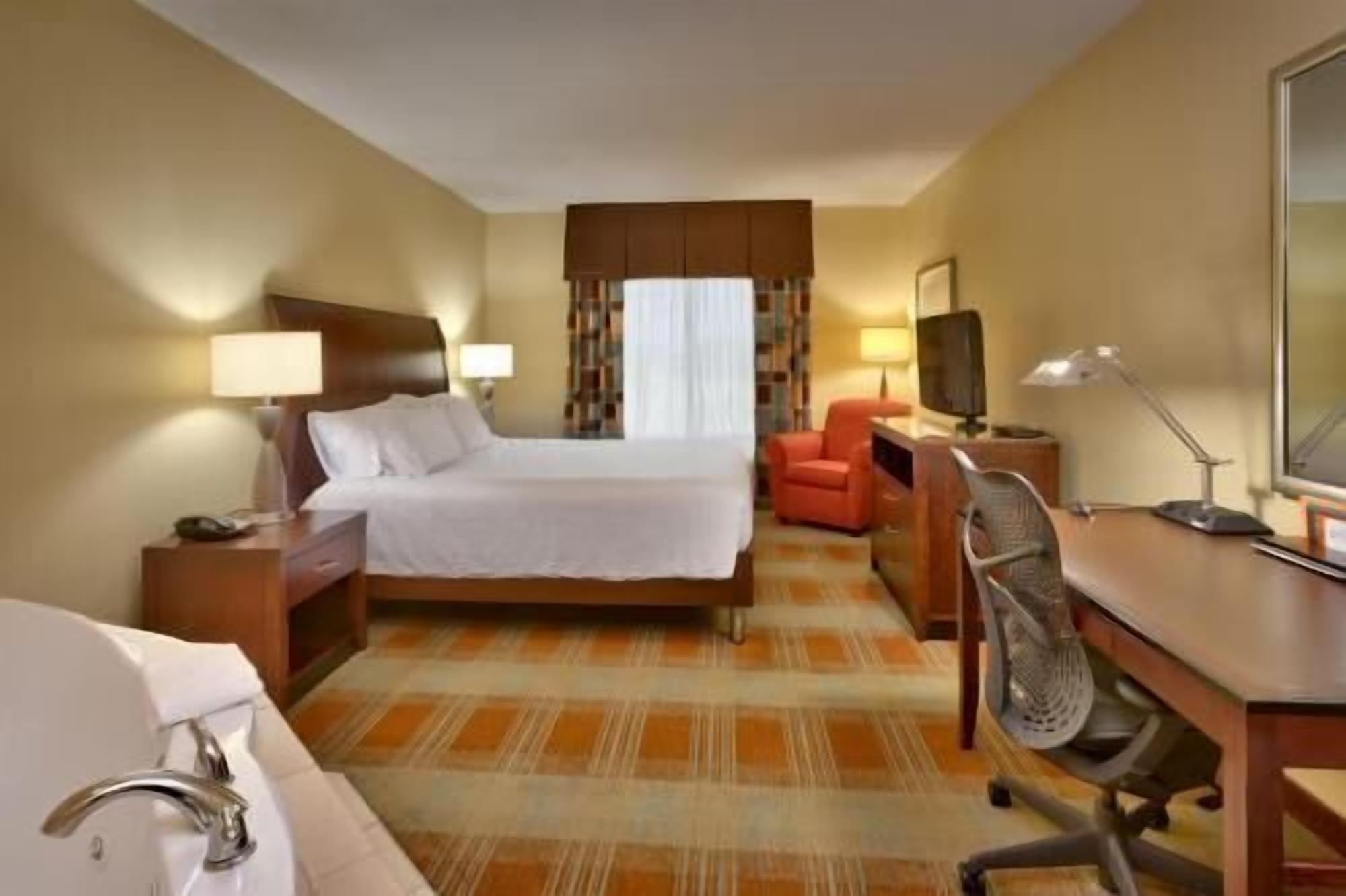 Premium bedding, down duvets, in-room safe, desk