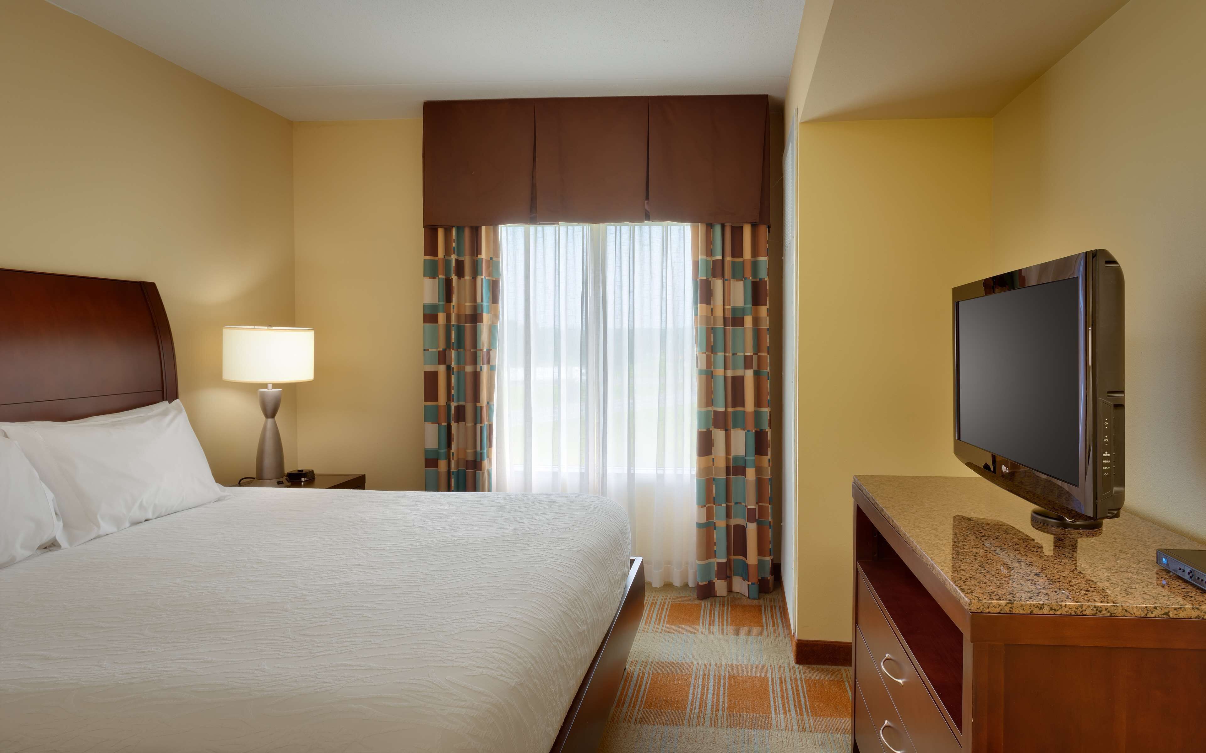 Premium bedding, down duvets, in-room safe, desk