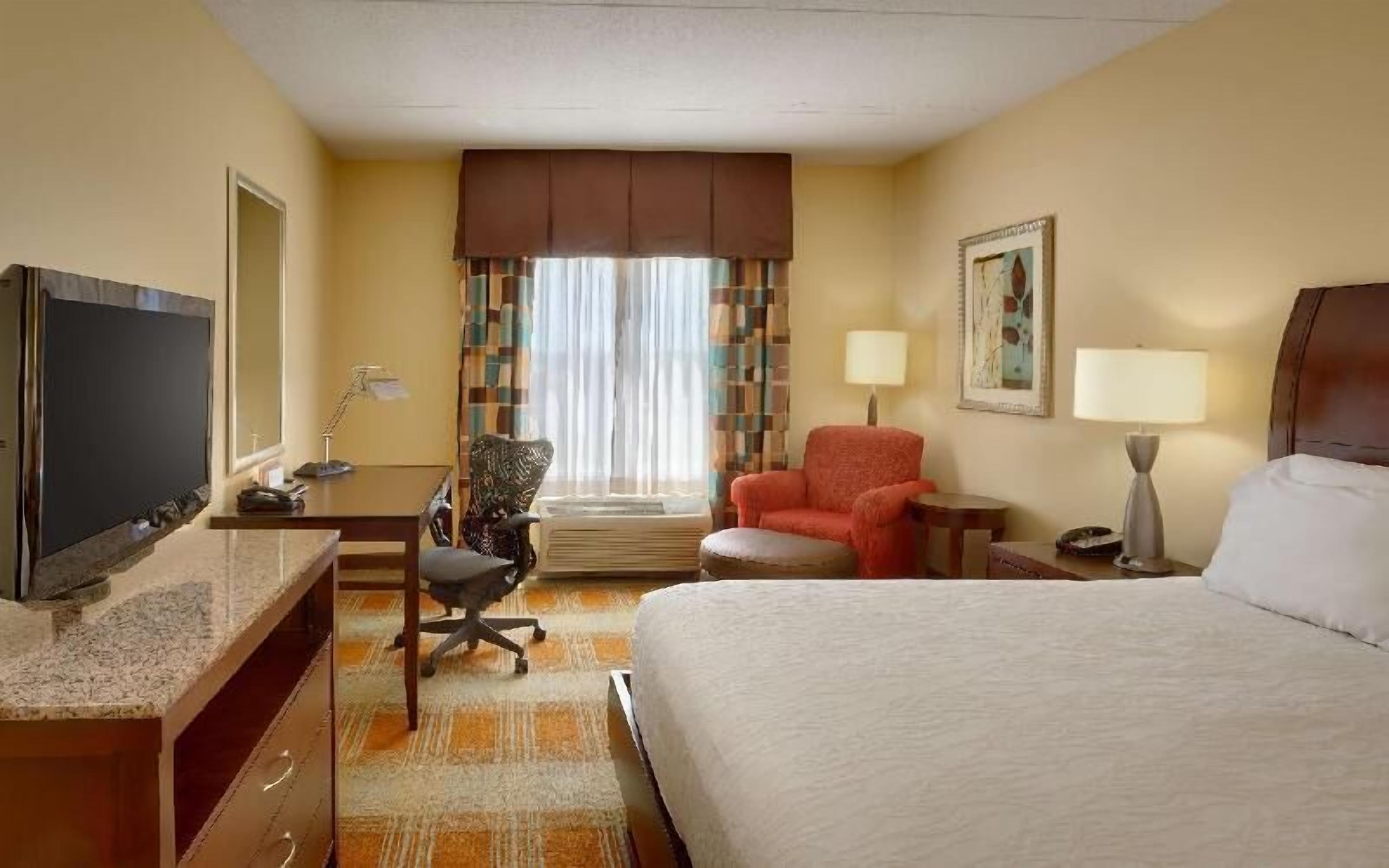 Premium bedding, down duvets, in-room safe, desk