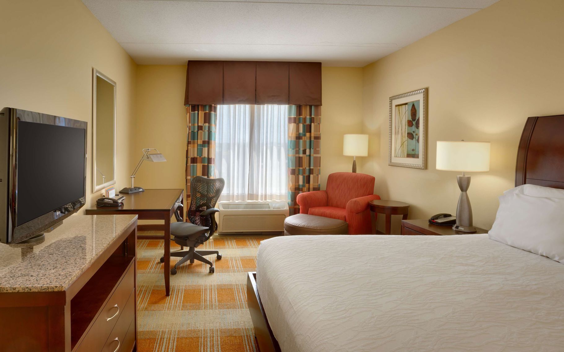 Premium bedding, down duvets, in-room safe, desk