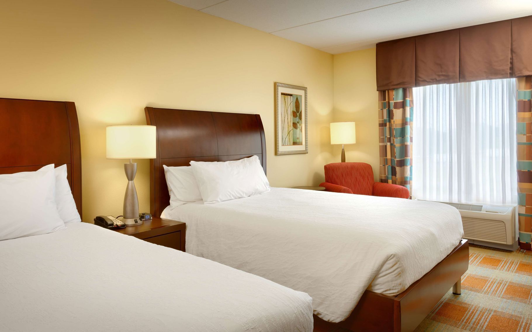 Premium bedding, down duvets, in-room safe, desk
