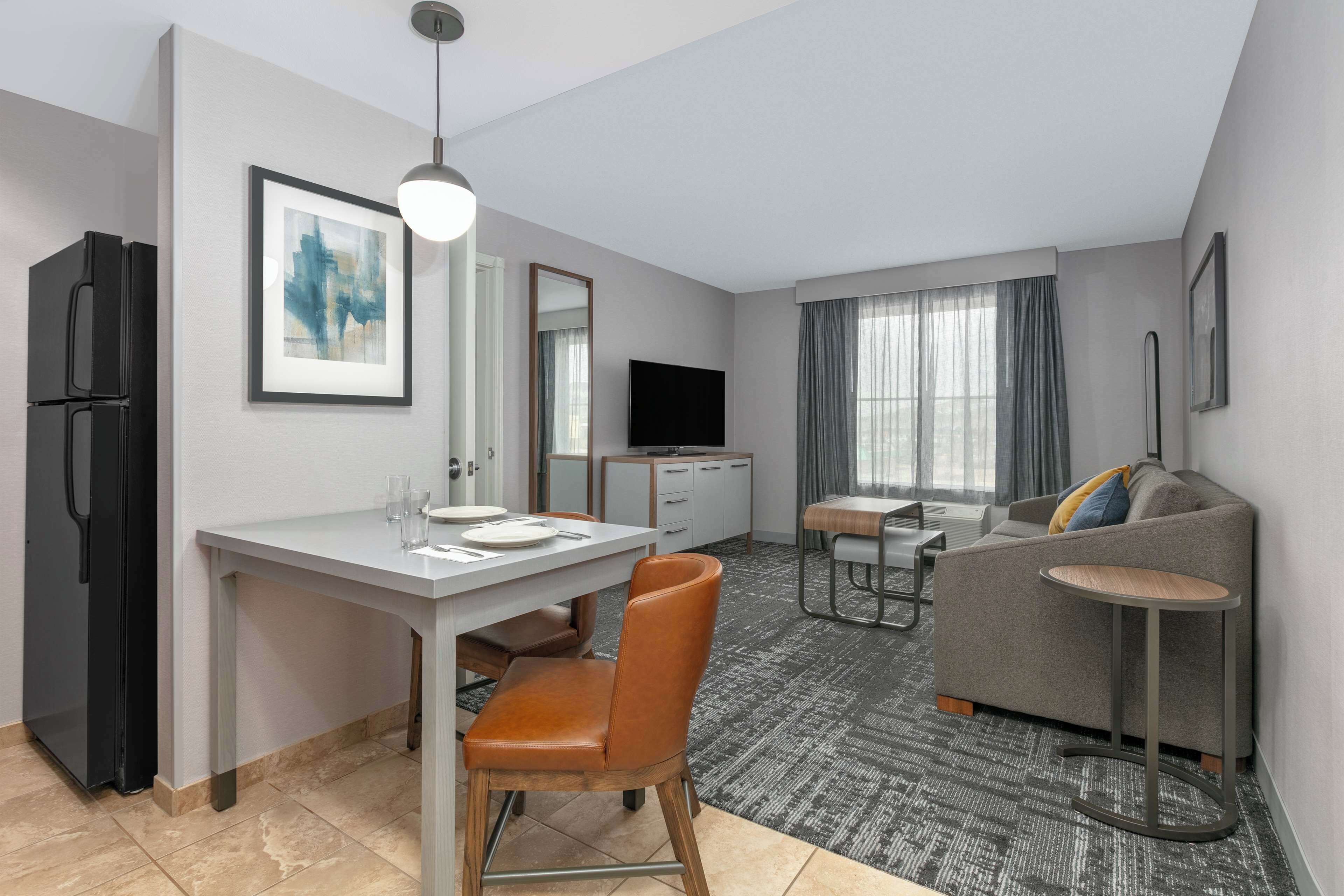 1 bdrm ste king bed no smkg | living area | 42-inch tv with cable channels