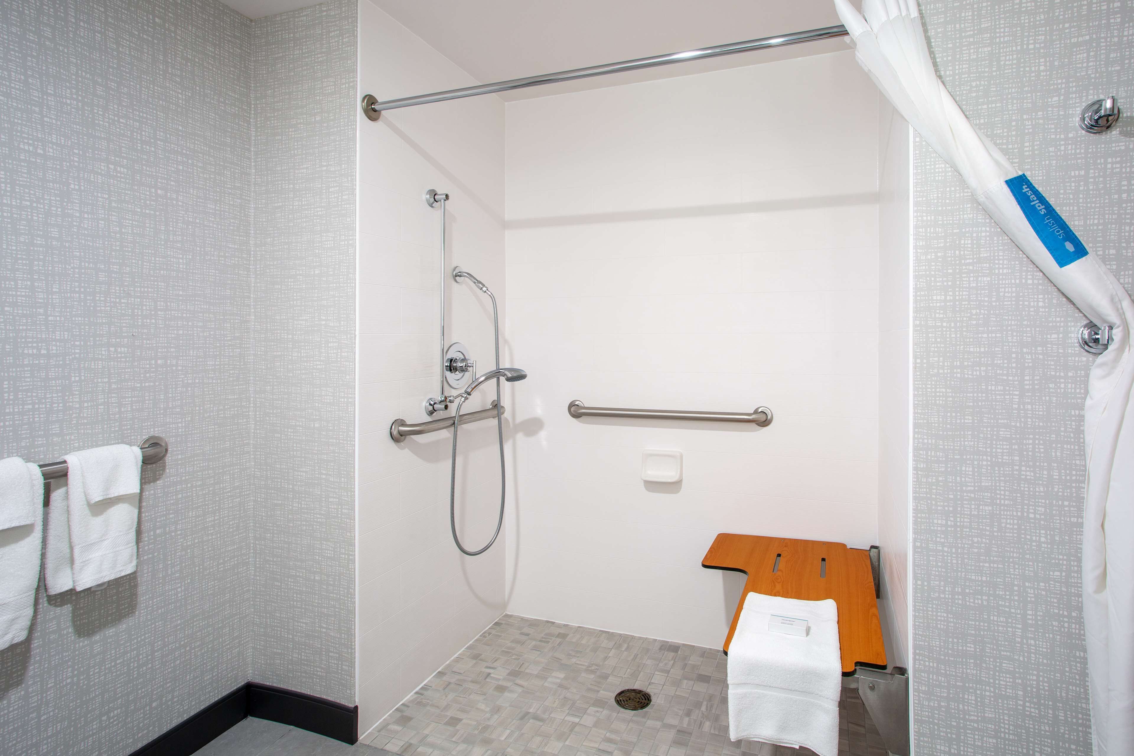 eco-friendly toiletries, hair dryer, towels, soap