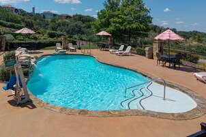 Outdoor pool, open 8:00 AM to 10:00 PM, sun loungers