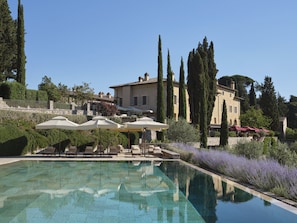 2 outdoor pools, open 8:30 AM to 6:30 PM, pool umbrellas, pool loungers