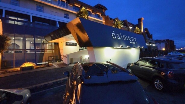 A hotel named 'dalmeny' with a modern facade, parked cars, and a well-lit entrance. - Dalmeny Resort Hotel (Lytham St. Anne's)