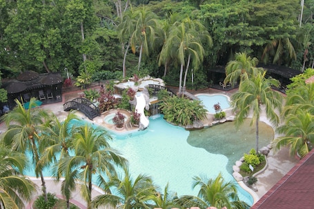 Outdoor pool, sun loungers. Sabah Hotel Sandakan