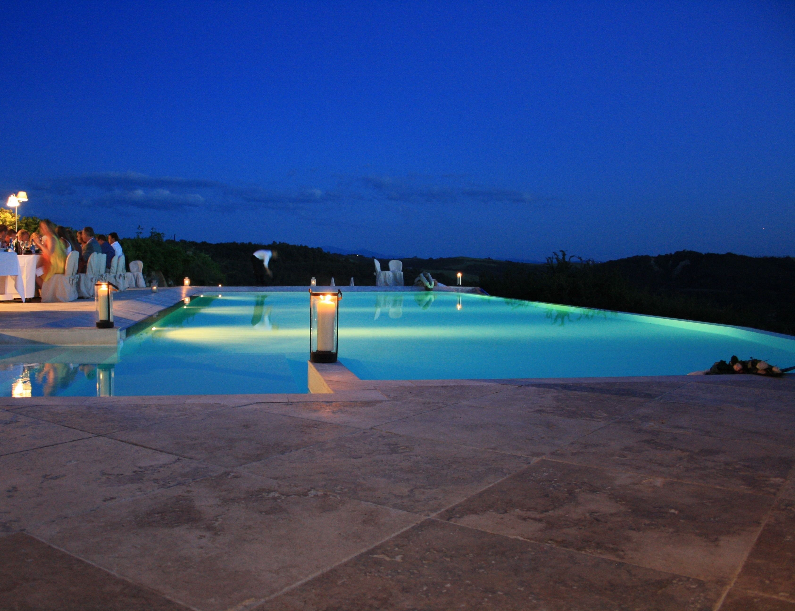 outdoor pool, an infinity pool, pool loungers