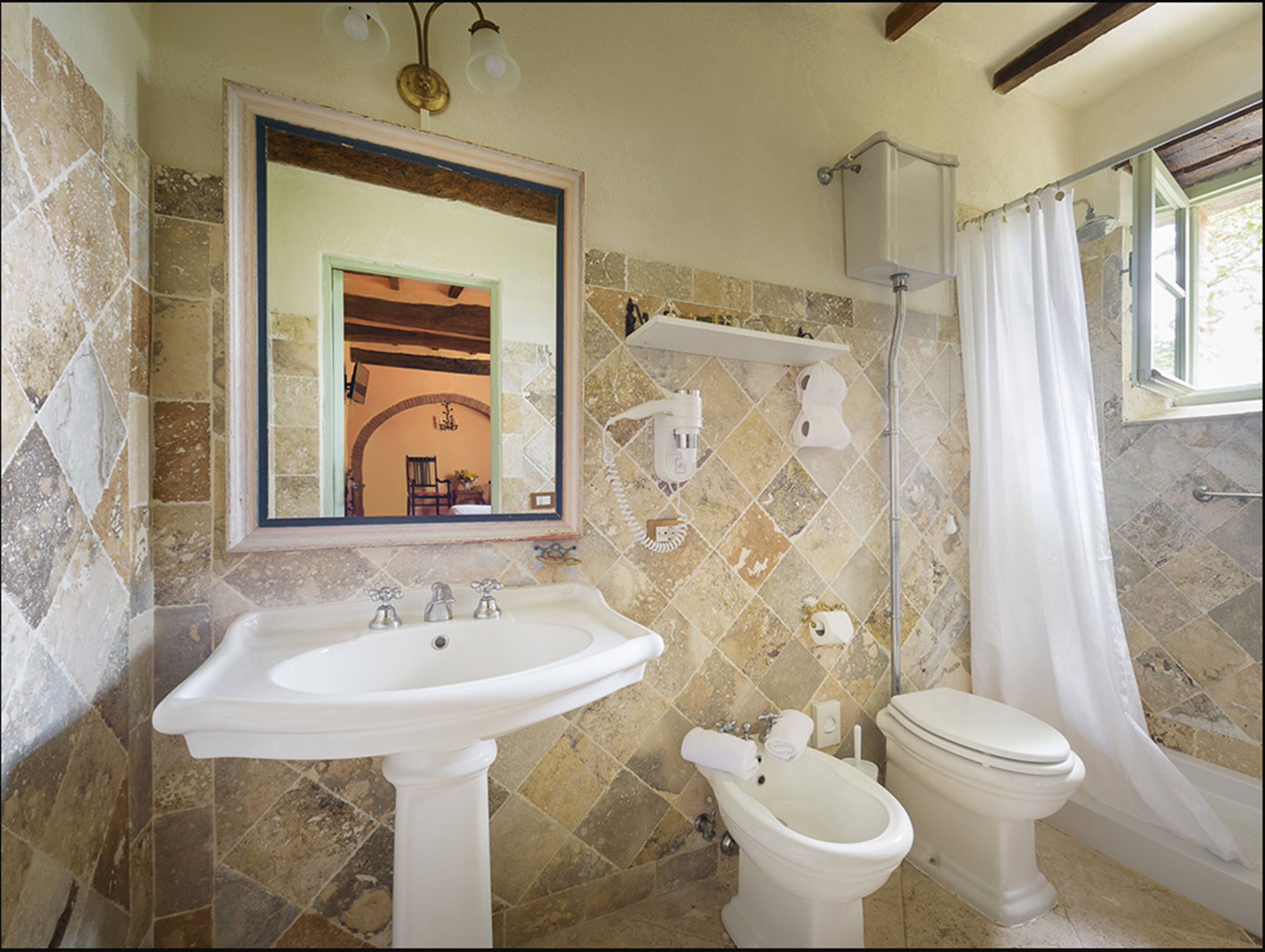 free toiletries, hair dryer, bidet, towels