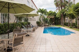Outdoor pool, open 8 AM to 10 PM, sun loungers