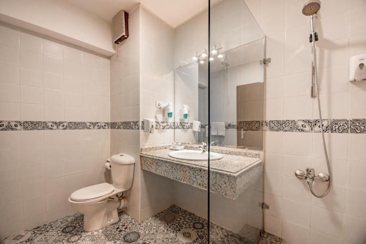 Bathroom | Shower, free toiletries, hair dryer, towels