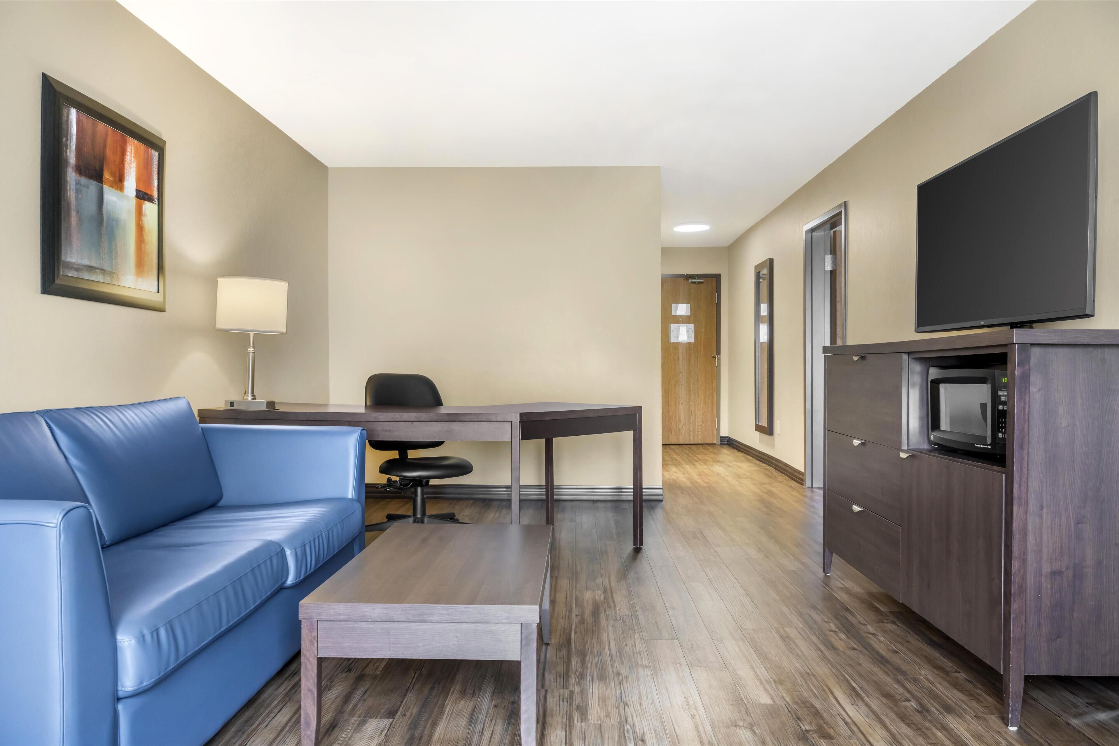 suite, 1 king bed, non smoking, refrigerator & microwave (with sofabed) | desk, laptop workspace, blackout curtains, iron/ironing board