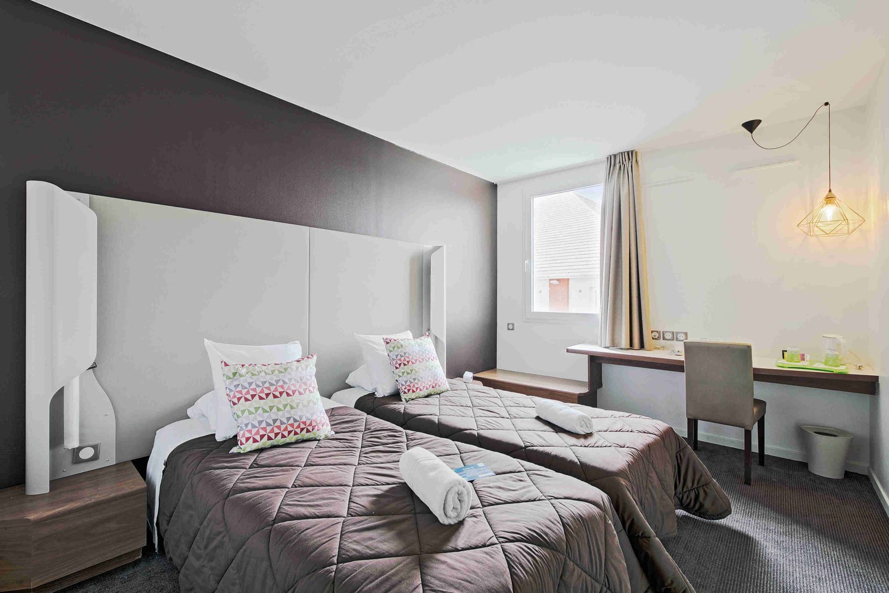 Premium bedding, individually furnished, desk, laptop workspace