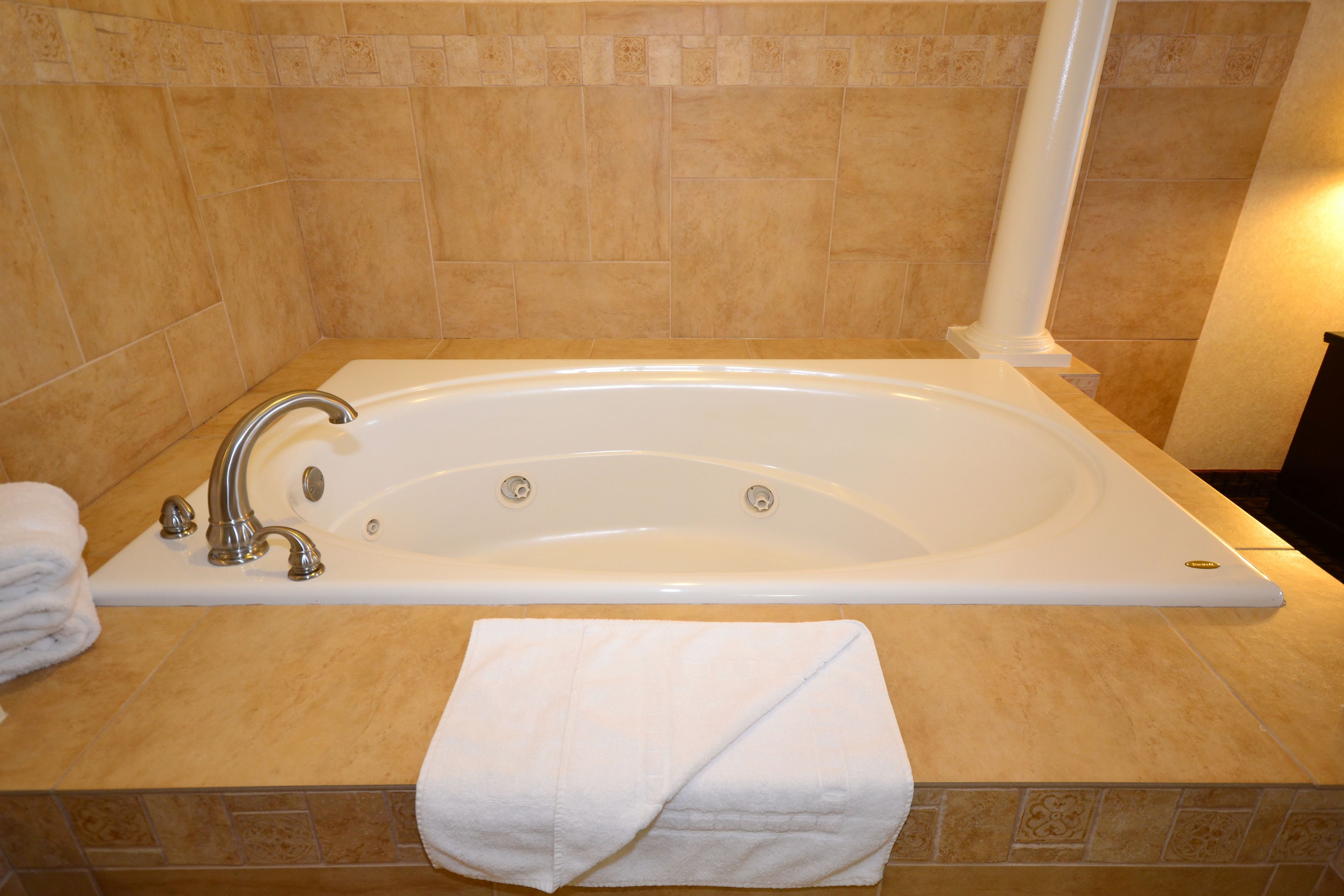 suite, 1 king bed, non smoking, jetted tub | in-room safe, individually decorated, individually furnished, desk