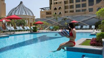 Outdoor pool, open 8:00 AM to 8:00 PM, pool umbrellas, pool loungers