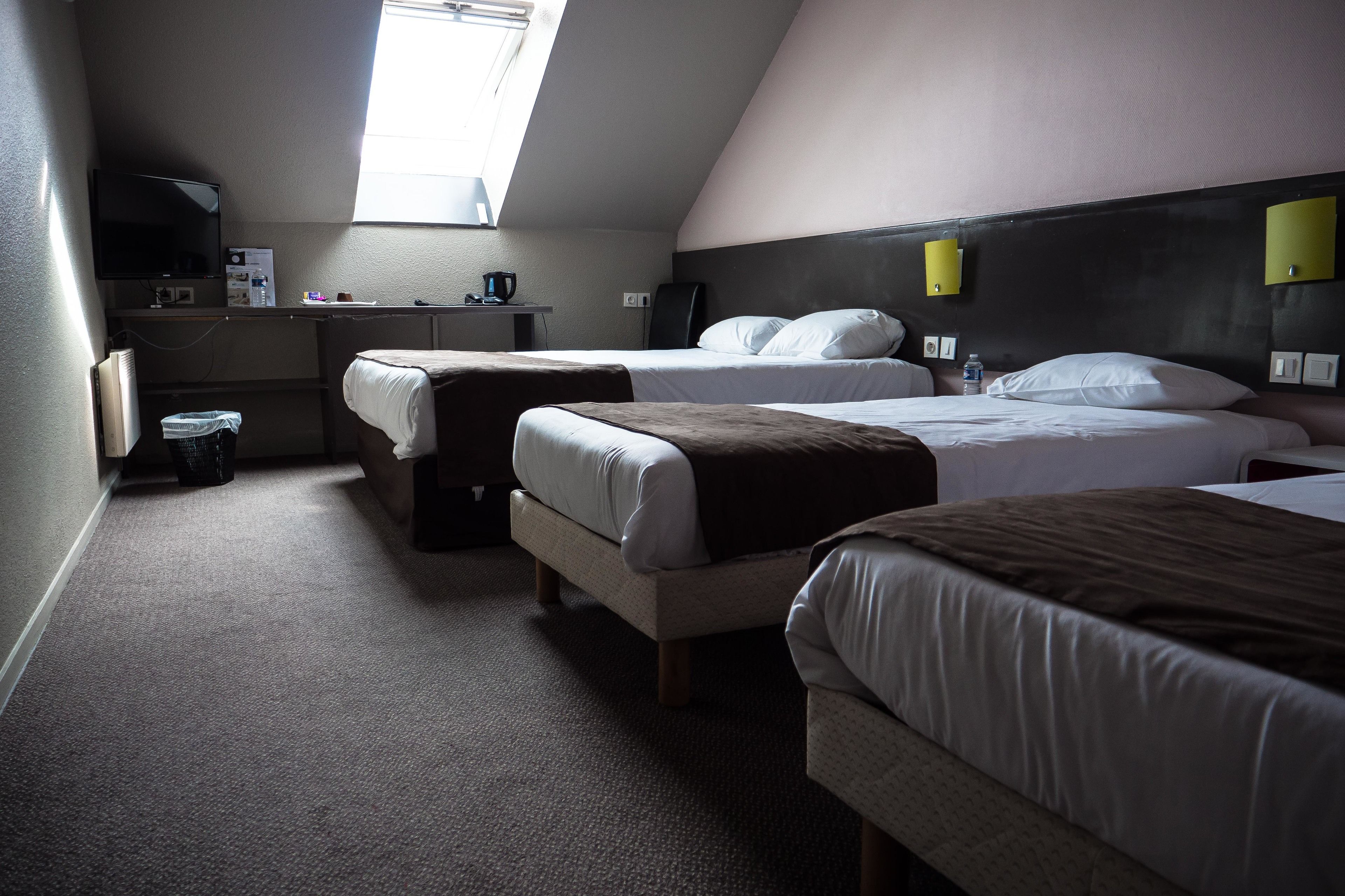 family room | 8 bedrooms, desk, blackout curtains, soundproofing