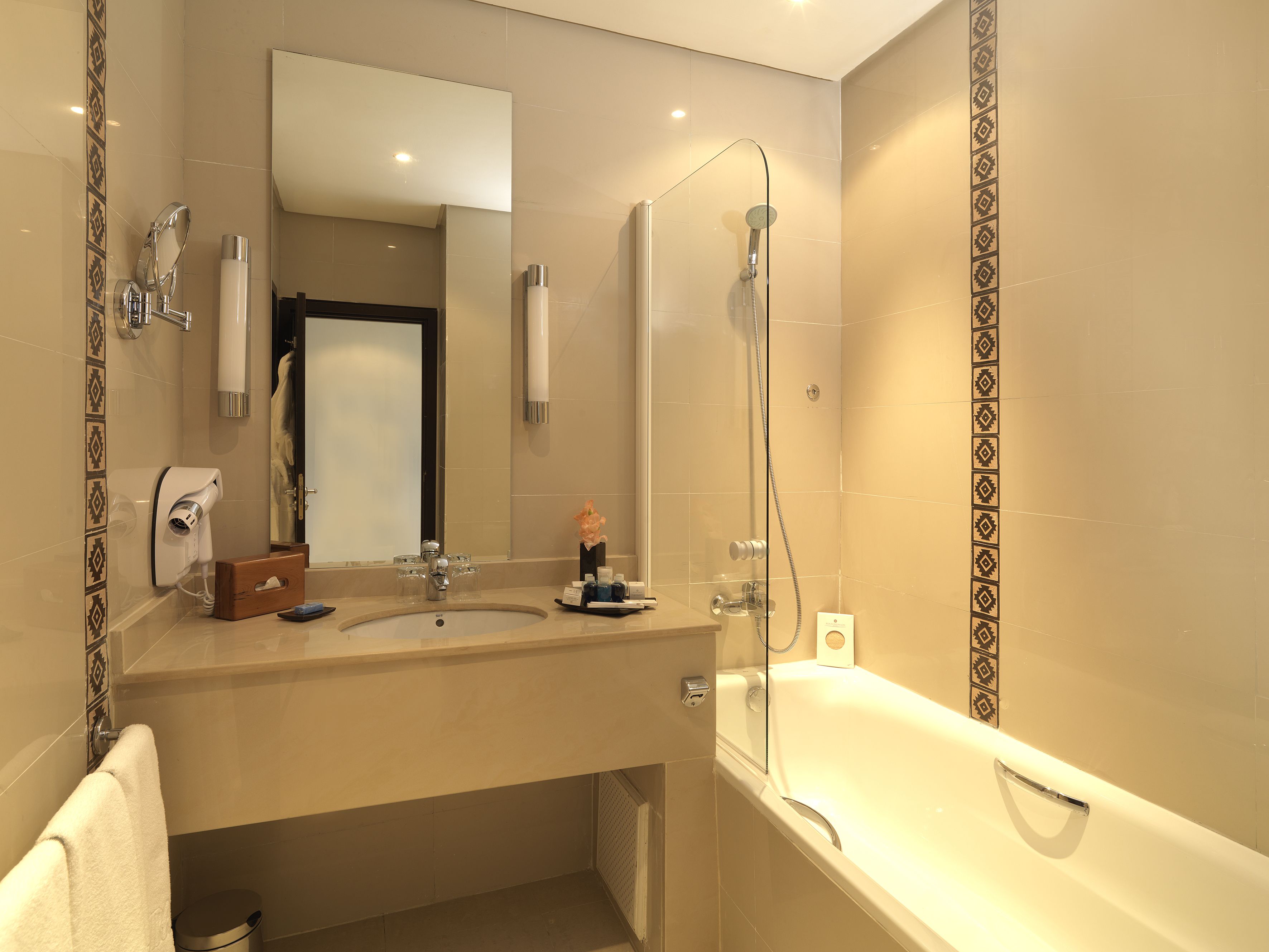 bathtub, free toiletries, hair dryer, bathrobes