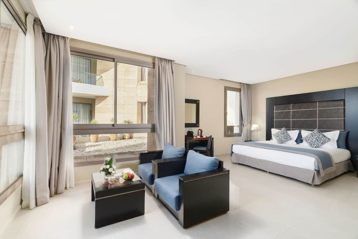 junior suite, sea view | 1 bedroom, premium bedding, minibar, in-room safe