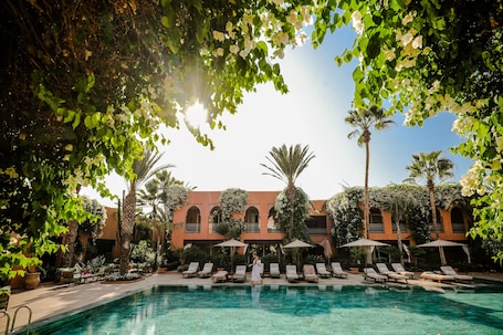 Indoor pool, outdoor pool, pool umbrellas, sun loungers