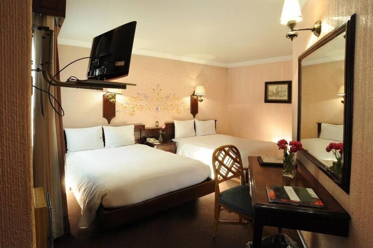 1 dormitorio y ropa de cama de alta calidad
