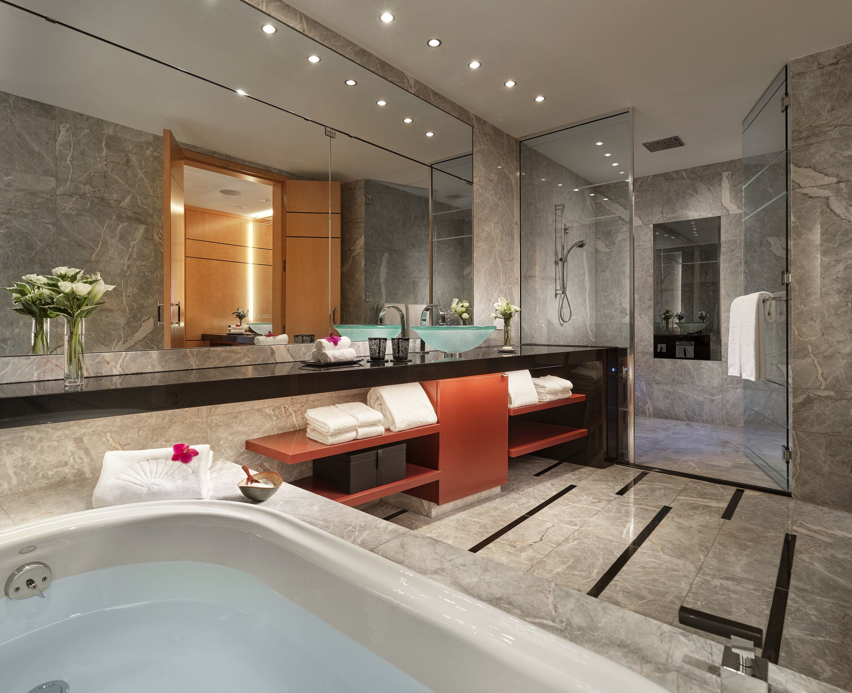 separate bathtub and shower, deep-soaking bathtub, designer toiletries