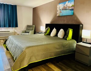 Premium Room, 1 King Bed | Desk, laptop workspace, blackout drapes, iron/ironing board - R Nite Star Inn & Suite (Arlington)