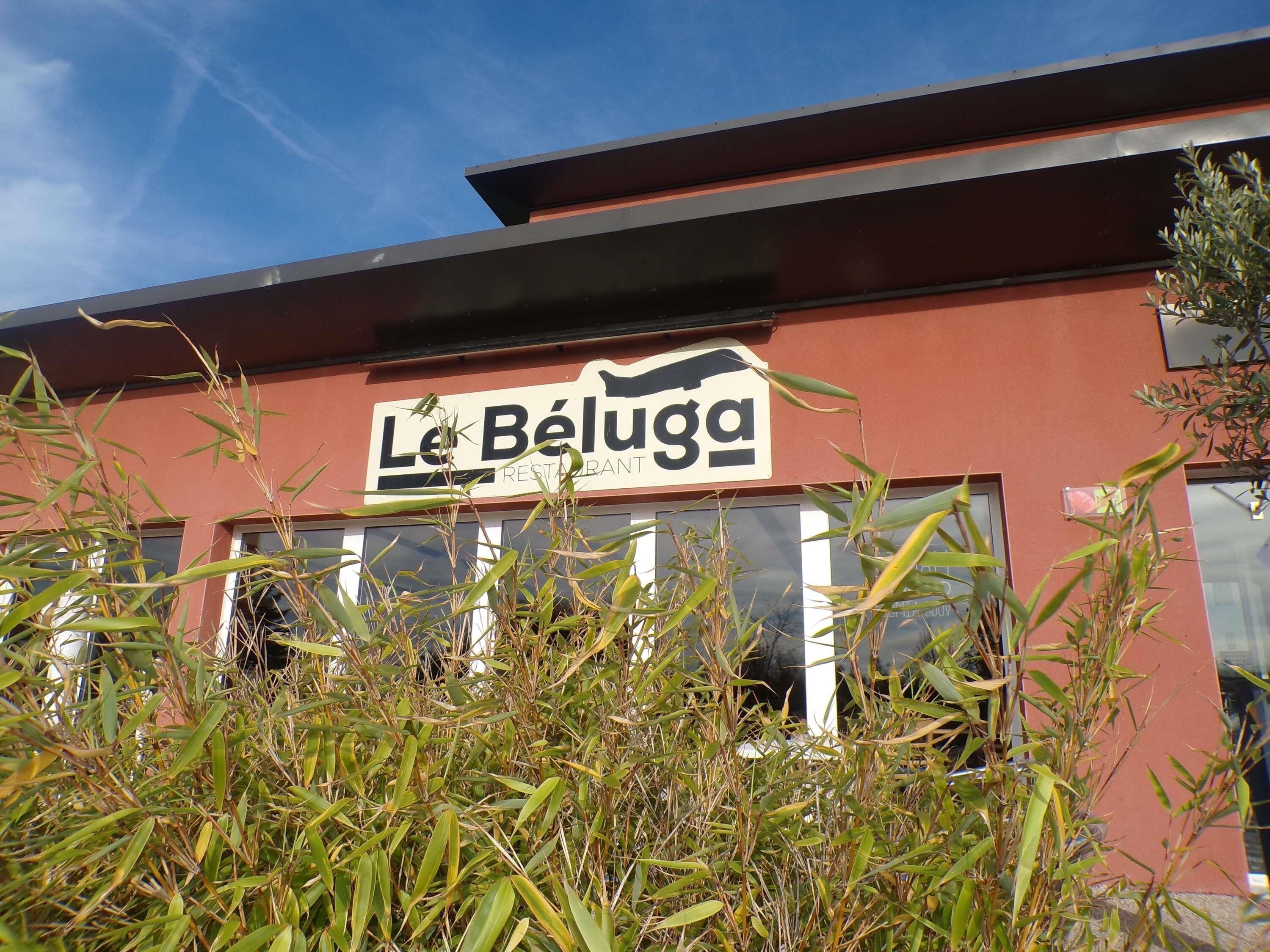A restaurant named 'Le Béluaga' with a red exterior and a signboard.