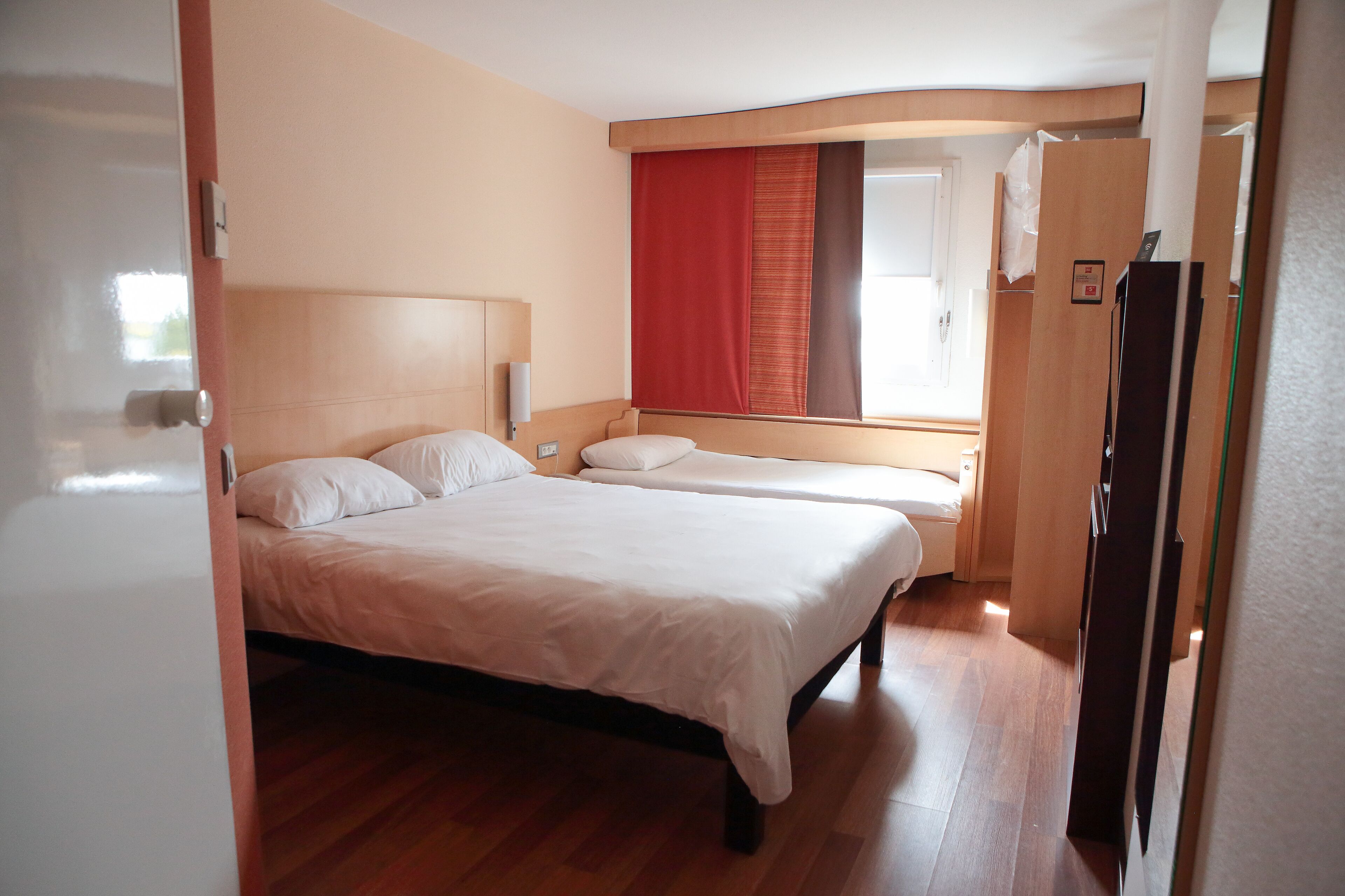 triple room, multiple beds | desk, blackout curtains, soundproofing, iron/ironing board