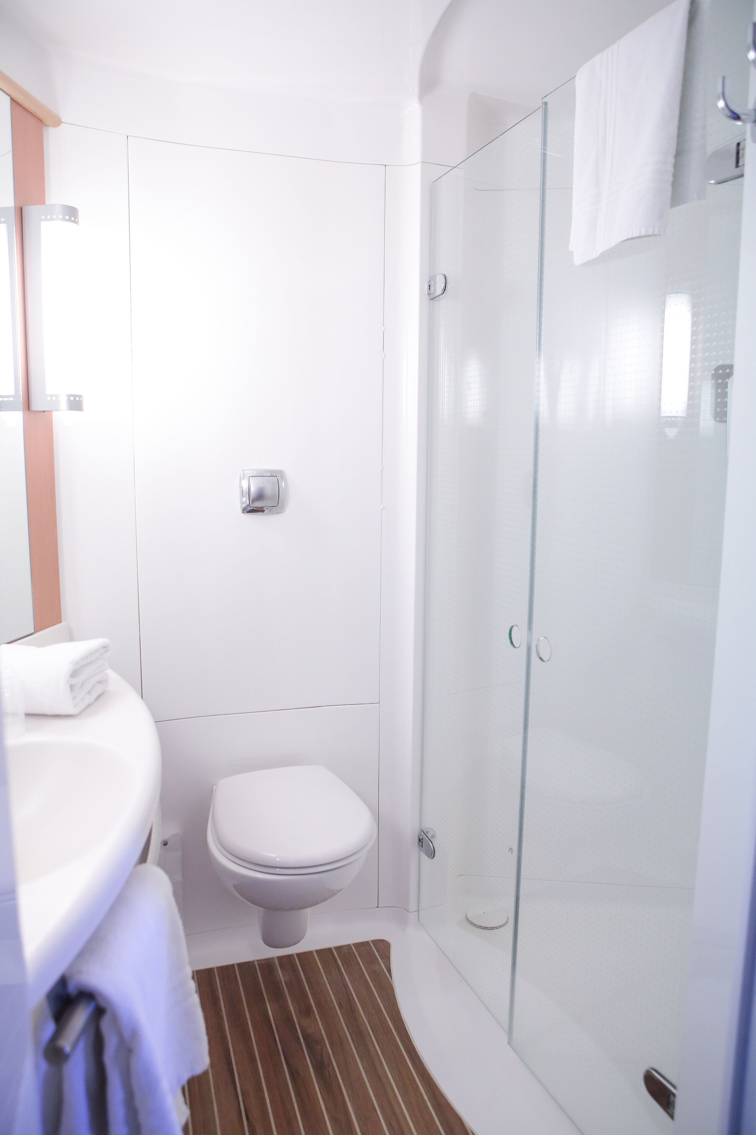 shower, eco-friendly toiletries, hair dryer, towels