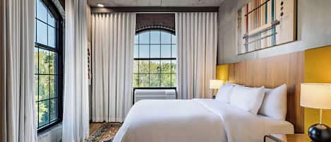 Hypo-allergenic bedding, down duvets, pillow-top beds, minibar