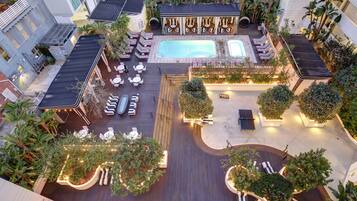 Outdoor pool, free pool cabanas, pool umbrellas
