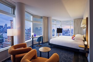 Premium bedding, down comforters, pillowtop beds, minibar